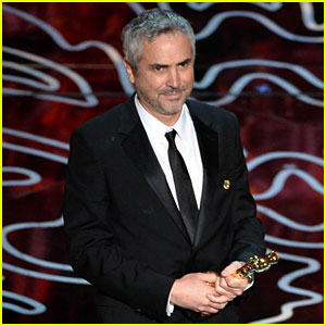 alfonso-cuaron-wins-best-director-for-gravity-at-oscars-2014